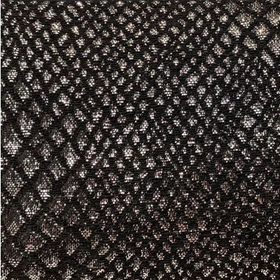 Tissu noir motif reptile argenté